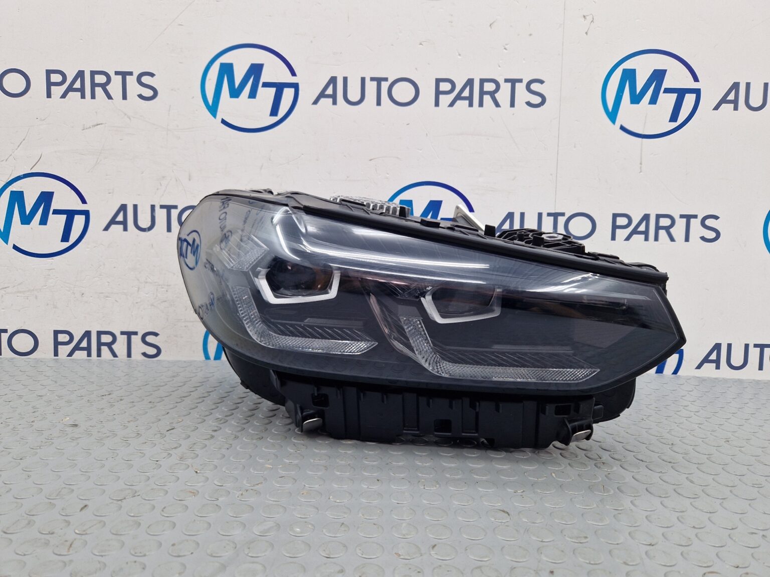Used BMW X3 adaptive LED headlight unit at MT Auto Parts